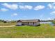 Well-maintained home featuring an attached garage and fenced yard near the lake at 16386 Se 156Th Place Rd, Weirsdale, FL 32195