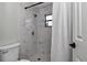 Bright shower with marble tiling and new fixtures at 16386 Se 156Th Place Rd, Weirsdale, FL 32195