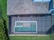 Overhead view of the private backyard pool and patio, and tile roof at 16768 Sanctuary Dr, Winter Garden, FL 34787