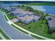 Aerial view of the house with a beautiful lake and surrounding area at 16768 Sanctuary Dr, Winter Garden, FL 34787