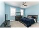 Inviting bedroom showcasing plush carpet, modern furniture, and ample natural light at 16768 Sanctuary Dr, Winter Garden, FL 34787