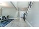 Bright foyer with tile flooring, a staircase, and a white front door at 16768 Sanctuary Dr, Winter Garden, FL 34787