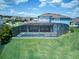 Aerial view of a screened-in backyard pool and patio area at 16768 Sanctuary Dr, Winter Garden, FL 34787