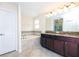 Bathroom features double vanity, bathtub, and tiled floors at 1748 Thetford Cir, Orlando, FL 32824