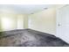 Spacious bedroom with neutral walls and carpet, offering a blank canvas for personalization at 1748 Thetford Cir, Orlando, FL 32824