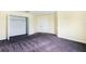 Spacious bedroom featuring carpeting, ample closet space, and neutral decor, ready for personalization at 1748 Thetford Cir, Orlando, FL 32824