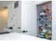 Organized pantry with wire shelving, offering ample storage space for food and household items at 17614 Woodcrest Way, Clermont, FL 34714