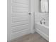 Bathroom featuring a soaking tub and tile surround at 18309 Oliver Twist Way, Winter Garden, FL 34787