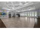 Large community room with ample space and elegant lighting for events and gatherings at 18309 Oliver Twist Way, Winter Garden, FL 34787