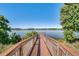 Wooden community dock overlooking the lake; relax and enjoy the beautiful water views at 18309 Oliver Twist Way, Winter Garden, FL 34787