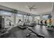 Fully equipped fitness center featuring treadmills, elliptical machines, and free weights at 18309 Oliver Twist Way, Winter Garden, FL 34787