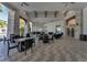 Beautiful outdoor community seating area with stone pillars, high ceilings, and tiled floors at 18309 Oliver Twist Way, Winter Garden, FL 34787