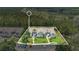 Aerial view of the property highlighting its architectural design and landscaped surroundings at 2020 Royal Bay Blvd # 91, Kissimmee, FL 34746