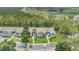 Property aerial view displaying the building, parking, and beautiful tree-lined landscaping at 2020 Royal Bay Blvd # 91, Kissimmee, FL 34746