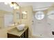 Modern bathroom with vessel sink, custom shower and tile at 2020 Royal Bay Blvd # 91, Kissimmee, FL 34746