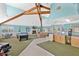 Bright clubhouse featuring a fireplace, pool table, kitchenette, and cozy seating area at 2020 Royal Bay Blvd # 91, Kissimmee, FL 34746