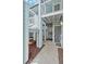 Welcoming entrance area with clean lines, a secure entry, and a tidy walkway leading to a pleasant living space at 2020 Royal Bay Blvd # 91, Kissimmee, FL 34746