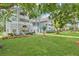 Lovely exterior featuring well-maintained landscaping, mature trees, and architectural details providing curb appeal and an inviting ambiance at 2020 Royal Bay Blvd # 91, Kissimmee, FL 34746