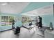 Well-equipped gym with exercise machines and large windows, perfect for a healthy lifestyle at 2020 Royal Bay Blvd # 91, Kissimmee, FL 34746