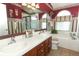 Well-lit bathroom featuring double sinks, garden tub and separate shower at 2021 Wildfire Ct, Apopka, FL 32703