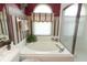 Bright bathroom with a garden tub and a separate shower at 2021 Wildfire Ct, Apopka, FL 32703