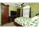 Bedroom with ceiling fan and green walls at 2021 Wildfire Ct, Apopka, FL 32703