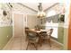 Cozy breakfast nook with wicker chairs and large window at 2021 Wildfire Ct, Apopka, FL 32703