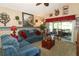 Comfortable living room with sliding glass doors to outside patio at 2021 Wildfire Ct, Apopka, FL 32703
