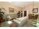 View of the open-concept living room with vaulted ceilings and lots of light at 2021 Wildfire Ct, Apopka, FL 32703
