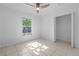 A spacious room with a large window and a good size closet at 215 Bradbury Ave, Oak Hill, FL 32759