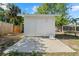 Backyard storage shed and concrete foundation at 215 Bradbury Ave, Oak Hill, FL 32759