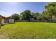 Spacious fenced backyard offers plenty of room for outdoor activities and relaxation at 2222 Catherine St, Kissimmee, FL 34741