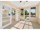 Open and bright Florida room with tile flooring at 2222 Catherine St, Kissimmee, FL 34741