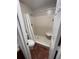 Bathroom with a toilet and shower area featuring white tiled walls at 2236 Stonington Ave # 2236, Orlando, FL 32817