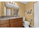 Bright bathroom with shower over tub and modern vanity at 2344 Whispering Maple Dr., Orlando, FL 32837