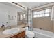 Bathroom features a tub and shower, vanity, and tile flooring at 2344 Whispering Maple Dr., Orlando, FL 32837