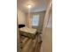 Bedroom with a bed, window, and wood floors at 2937 Econ Landing Blvd, Orlando, FL 32825