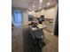 Well-equipped kitchen with island, stainless steel appliances, and ample cabinetry at 2937 Econ Landing Blvd, Orlando, FL 32825