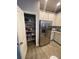 Pantry and stainless steel refrigerator with lots of cabinet space at 2937 Econ Landing Blvd, Orlando, FL 32825