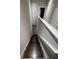 Staircase with white railing leading to the lower level at 2937 Econ Landing Blvd, Orlando, FL 32825
