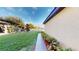 Well maintained front yard with manicured landscaping and a tile walkway, offering great curb appeal at 3044 Camino Real S Dr, Kissimmee, FL 34744