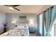 The main bedroom offers natural light and hardwood floors at 3044 Camino Real S Dr, Kissimmee, FL 34744