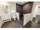 Bathroom with a modern tiled shower with seating, a window, and marble countertops at 3443 Wild Myrtle Ct, Windermere, FL 34786
