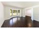Sunlit bedroom with bay window and hardwood floors, offering a comfortable and stylish retreat at 3443 Wild Myrtle Ct, Windermere, FL 34786