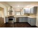 Bright kitchen with stainless steel appliances, sleek countertops, and modern cabinetry at 3443 Wild Myrtle Ct, Windermere, FL 34786
