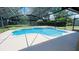 Screened-in pool featuring a unique geometric design at 3443 Wild Myrtle Ct, Windermere, FL 34786