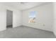 Cozy bedroom with bright natural light and a door leading to the closet at 351 Cloverdale Rd, Winter Haven, FL 33884