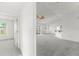 Open concept living room featuring neutral walls and seamless layout at 351 Cloverdale Rd, Winter Haven, FL 33884