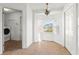Breakfast nook with tile flooring, large window and closet with washer and dryer at 351 Cloverdale Rd, Winter Haven, FL 33884