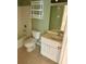 Clean bathroom featuring a vanity with ample storage, a toilet and a tub with shower at 3772 Idlebrook Cir # 100, Casselberry, FL 32707